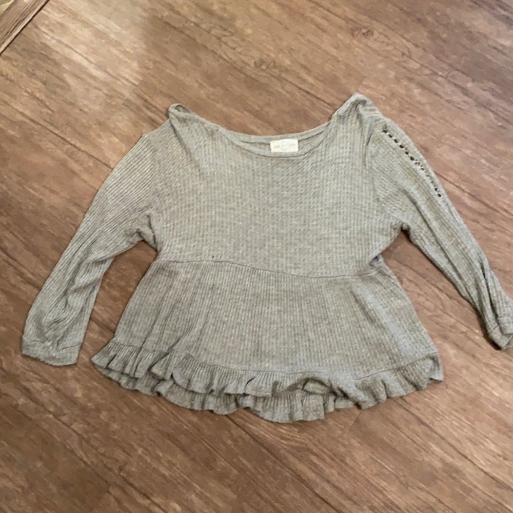 Cropped (just above the waist) blouse